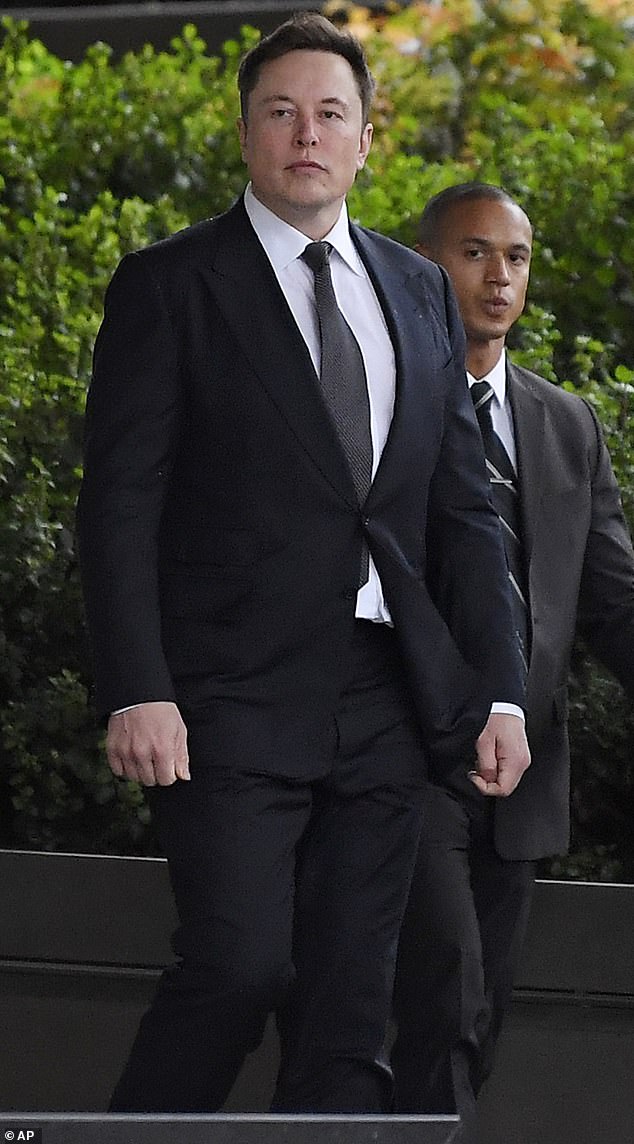 Elon Musk arrives in court for the second day of his defamation trial against a British diver who he called a 'pedo guy' on Twitter