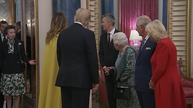 The Queen, 93, was filmed seemingly directing Princess Anne, 69, while welcoming President and Mrs Trump alongside Prince Charles, 70, and the Duchess of Cornwall, pictured