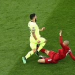 13213312-7002753-Fabinho_slides_in_to_win_the_ball_before_catching_Suarez_on_the_-a-38_1557264809042