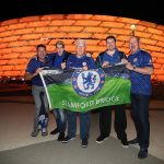 14110860-7083561-A_group_of_Chelsea_fans_pose_with_a_flag_ahead_of_the_Europa_Lea-a-15_1559154574193