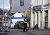 Teenager, 18, arrested for murder after man, 20, stabbed to death outside pizza shop in seaside town