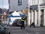 Teenager, 18, arrested for murder after man, 20, stabbed to death outside pizza shop in seaside town