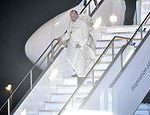High winds whip up Pope Francis’s white cape as he kicks off his trip to Japan