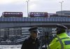 Double decker buses and cars sit abandoned on eerily quiet London Bridge two days after attack