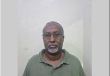 Booliska Soomaaliya oo xabsiga dhigay lataliyaha Deni